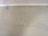 a close up of a piece of fabric on a wooden floor