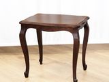 an image of a small wooden table on a hard wood floor