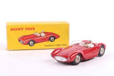 dinky toys red sports car with box on white background