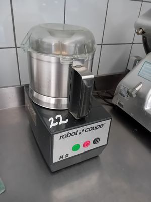 a blender that is sitting on a counter in a kitchen