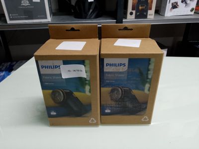 two boxes that are sitting on a table