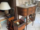 a table with a basket on top of it in a living room