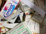 a cardboard box full of different types of mail