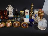 a table with a lot of glass items on it