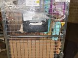 a metal cart with a bunch of boxes on it
