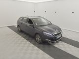 a picture of a car in a garage with a checkered floor
