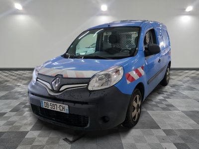 the blue van is parked on a checkered floor in the garage