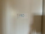 a sign that says no on the side of a refrigerator