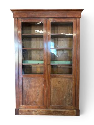 an image of a wooden cabinet with glass doors and shelves