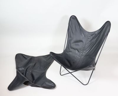 a black chair and a black chair on a white background