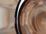 a close up view of a glass with water in it