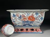 an image of a blue and white bowl and a red and white vase