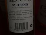a bottle of wine sitting next to a bottle of wine