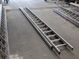 many ladders that are on the floor in a building