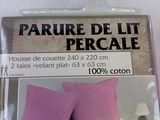 packaging of a pink bed with two pillows and a pillow case