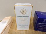 a box of cream next to a box of cream on a table