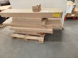 a stack of boxes sitting on a pallet in a warehouse