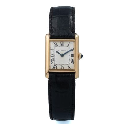 Montre Cartier Tank pour femme en or jaune 18 carats