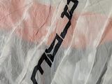a kite that is being flown on the ground
