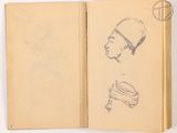 an open book with a drawing of a man ' s head and a woman ' s head