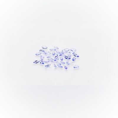 a group of blue sapphires on a white background
