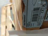 a stack of boxes that are sitting on a pallet