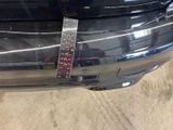 a sticker on the front bumper of a car