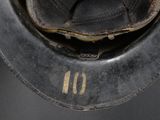 a close up of a helmet with a number on it