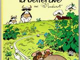a book with a picture of a mouse and other animals in a field