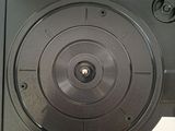 an image of a black record player with a white background