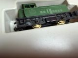 a toy train that is sitting in a box