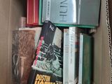 a box full of books sitting on a table