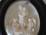 a picture of a picture of a statue in a bowl