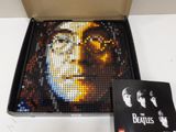 an image of a box with a picture of the beatles on it