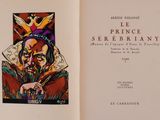 an open book with a picture of a man with a crown on top of it