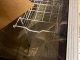 a picture of a picture of a oven with the door open
