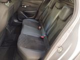 the back seats of a car with a seat belt in a car