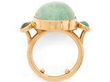 a close up of a gold ring with a green stone
