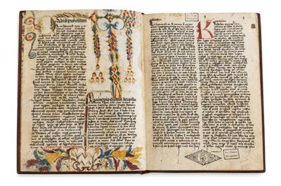 un livre ouvert sur lequel est dessiné une croix