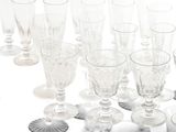a lot of empty wine glasses on the table