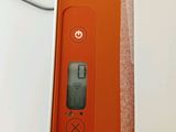 a box with a remote control in it on a table