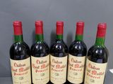 Six bouteilles de vin du Château d'Ordonne sont alignées sur une table