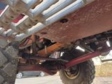 a close up view of a vehicle with a big tire