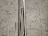 two pieces of metal on the floor next to each other