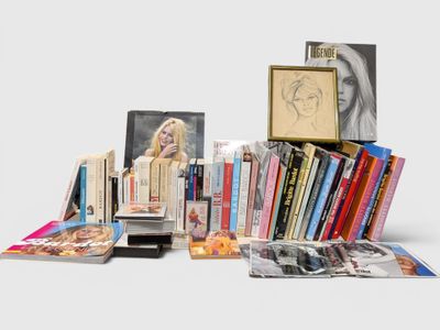 un grand nombre de livres empilés les uns sur les autres