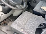 a car with a steering wheel and a seat in it