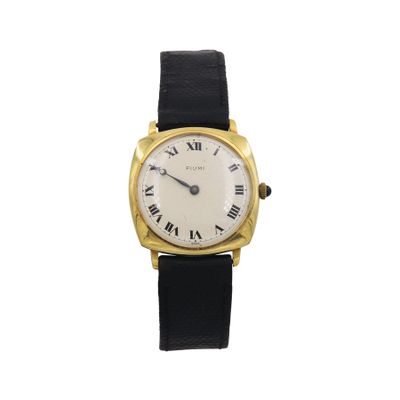 a close up of a watch with roman numerals on the face