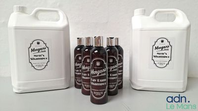 several bottles of liquid sitting next to each other on a table