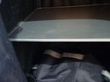a suitcase that is sitting in the back of a truck