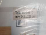 a picture of a picture of a bed in a plastic bag